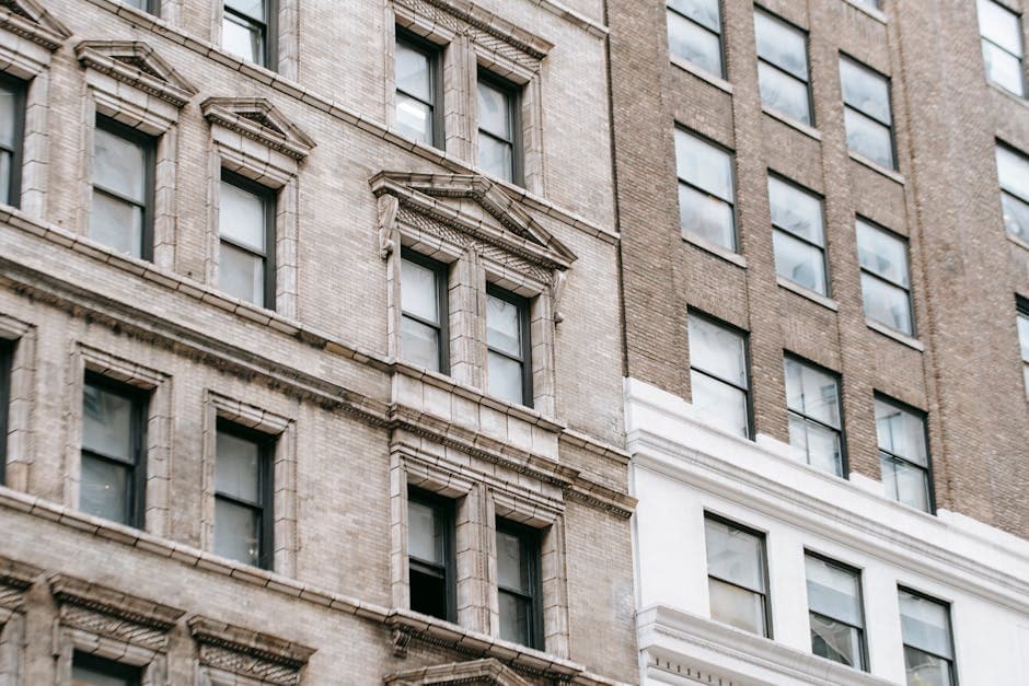 Close-up view of modern urban building facades showcasing architectural design and detail.